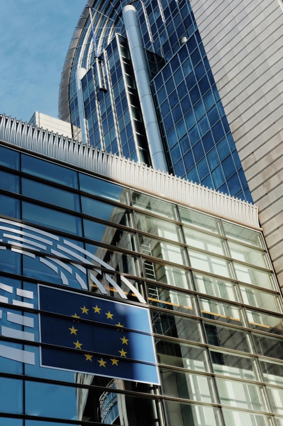 Modern European Union headquarters glass facade representing the 2026 EU cosmetic regulation rollout