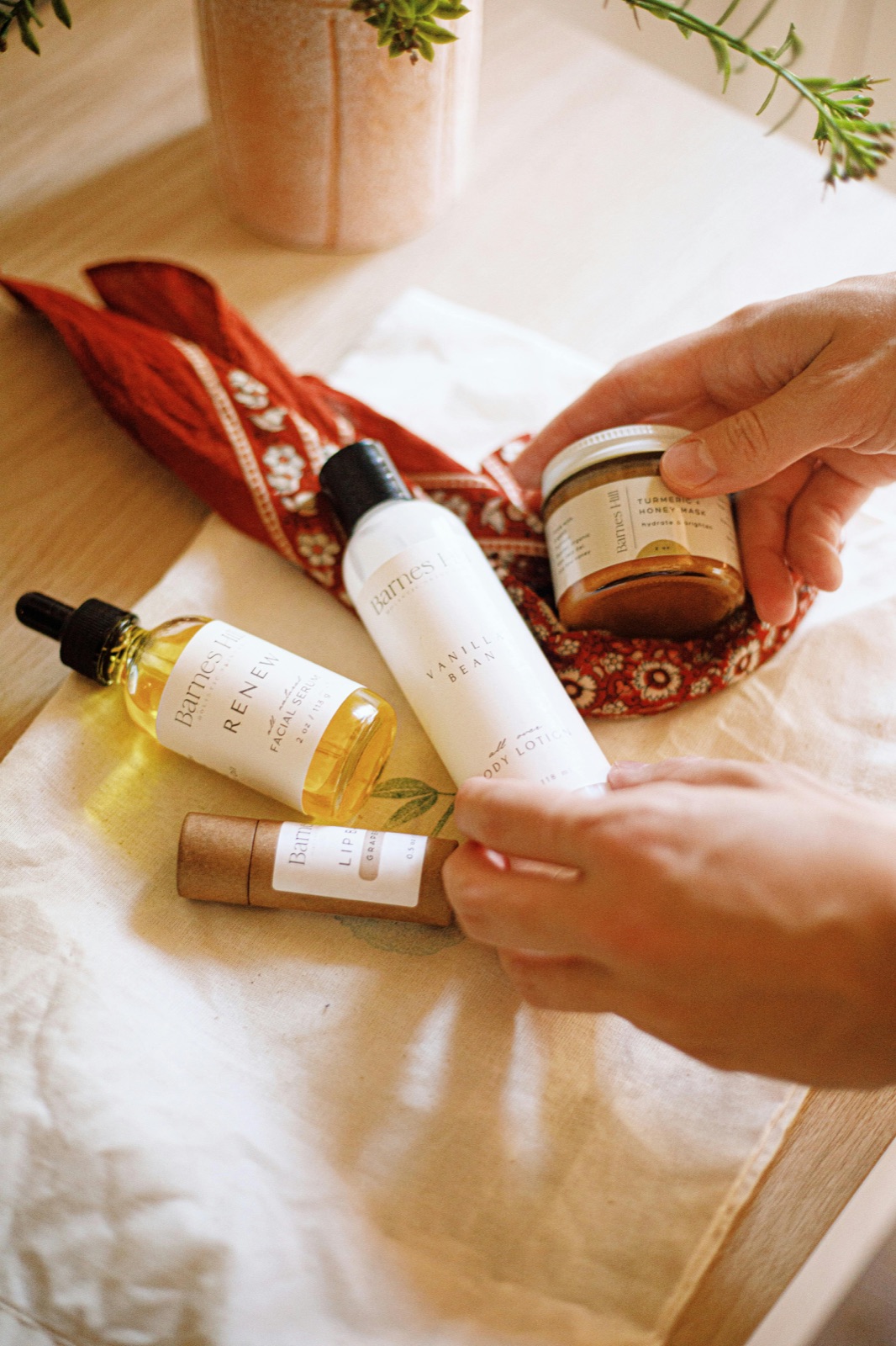 Minimalist natural skincare essentials arranged on a clean surface for beginners learning to read ingredients